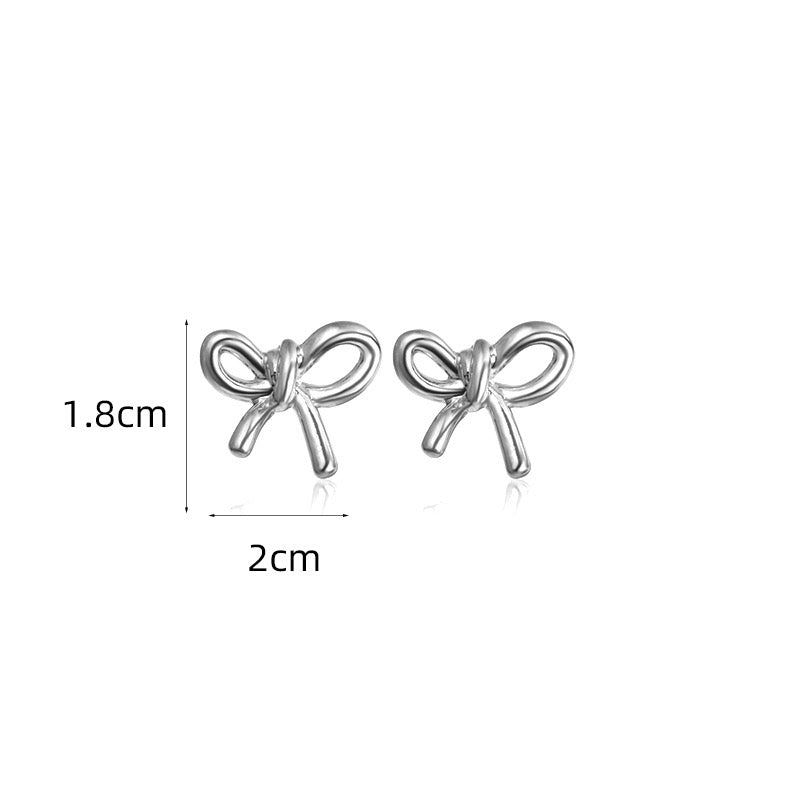 Camelia Silver Bow Studs